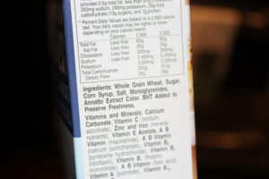 ...and "whole grain wheat" on the back. Don't love that sugar is #2, but at only 5g per serving, I am willing to put up with it.