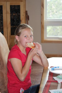 shannon enjoying pizza
