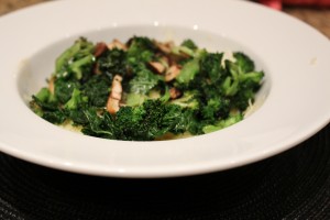 adding veggies on top of spaghetti squash