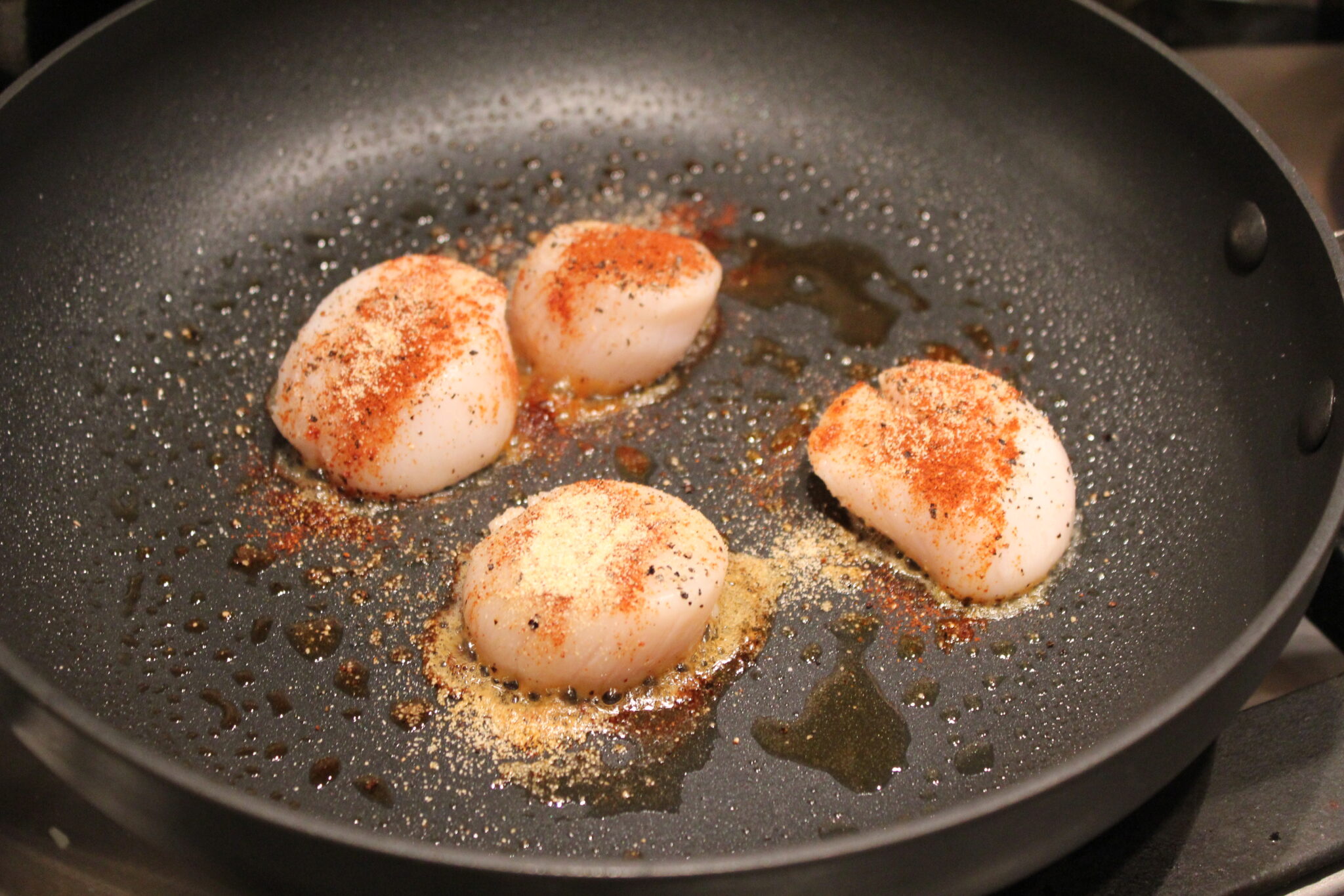 scallops sauteeing The Lyons' Share Wellness