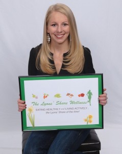 headshot with the lyons share sign